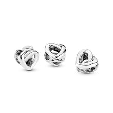 Load image into Gallery viewer, Knotted Heart Charm
